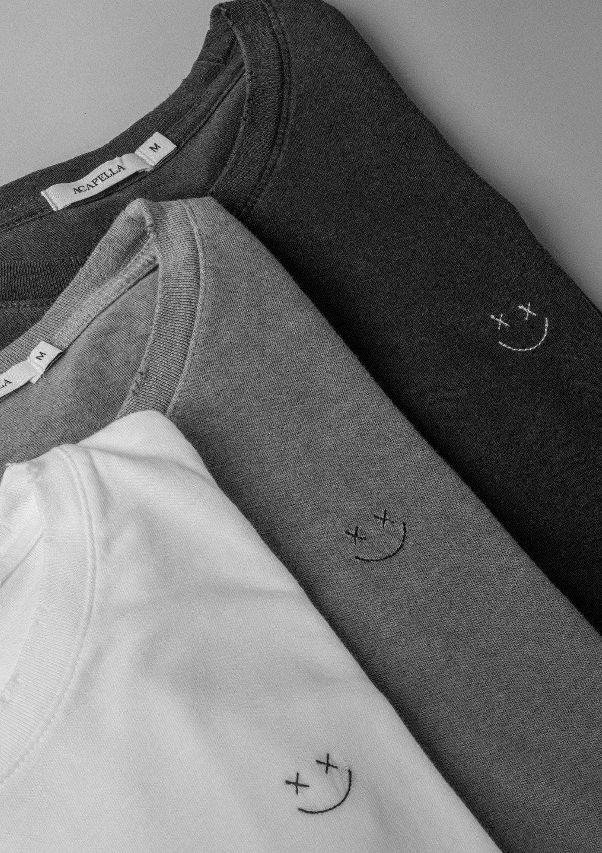 Brand Partner,Acapella, Acapella Washed Black Smiley Distressed Tee, Black, Medium-40-TagMLarge-43-TagLExtra Large-45-TagXLSmall-38-TagS